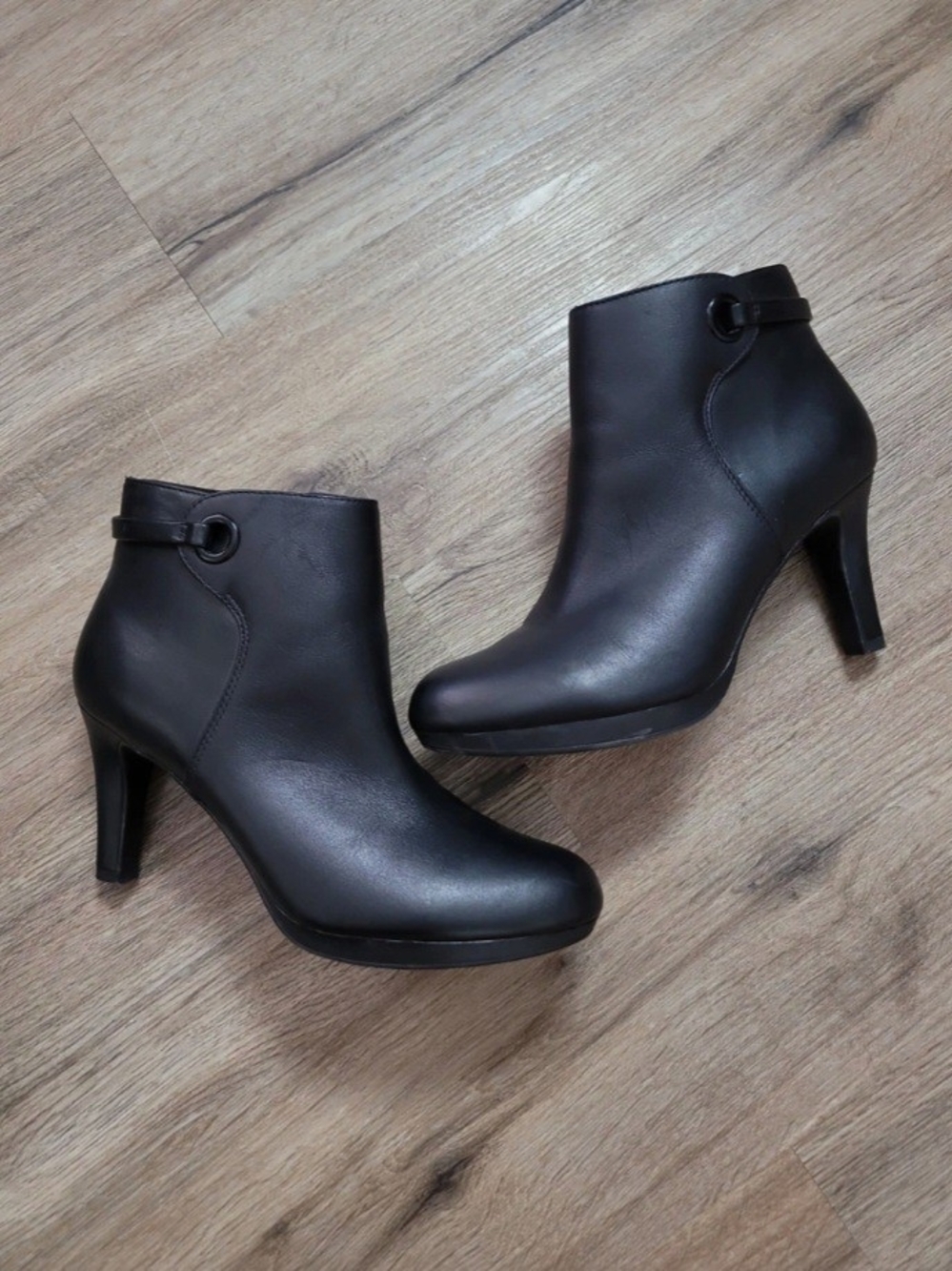 Clarks women Black Leather Ankle Booties with Strap Accent